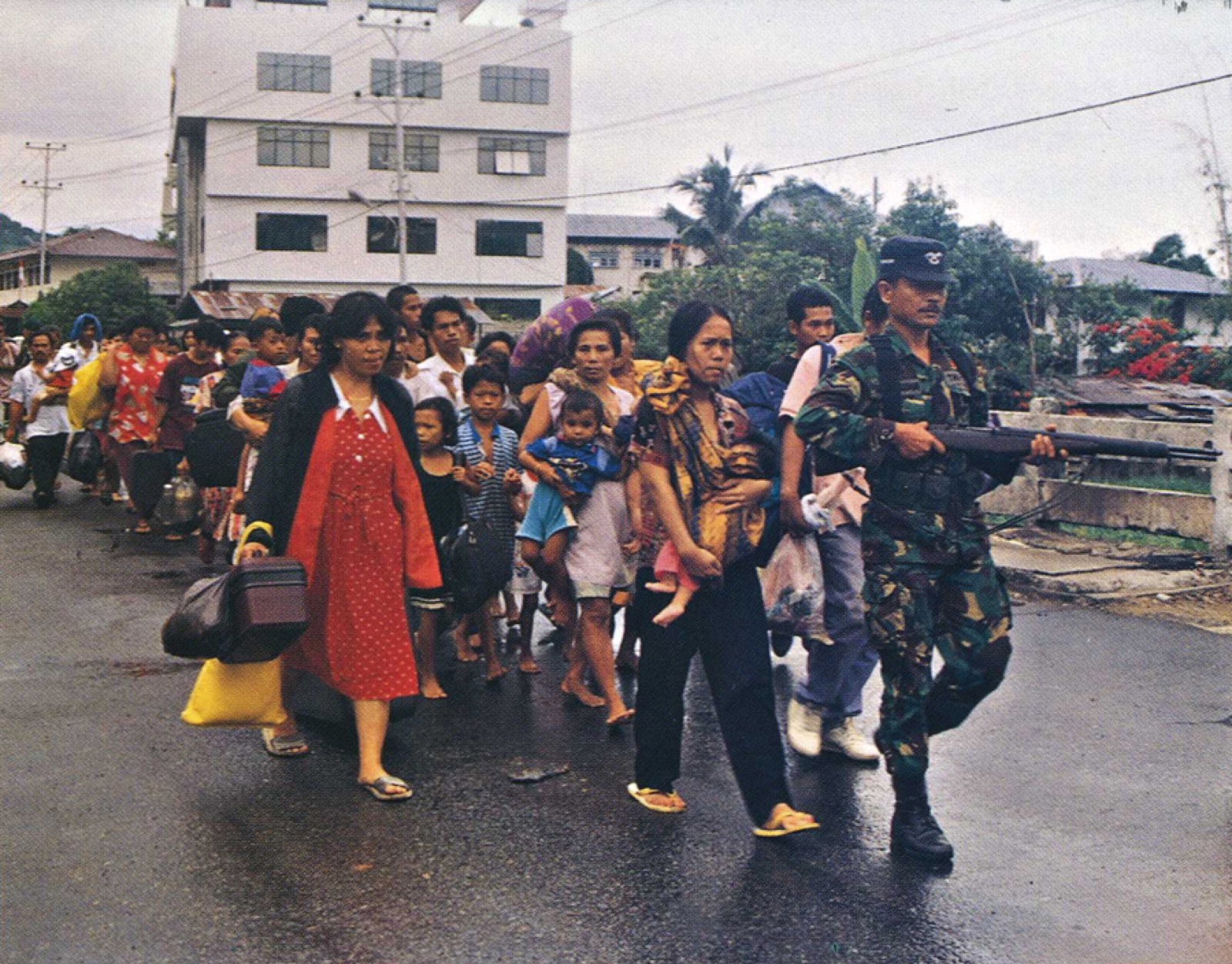Refugees being evacuated during the Ambon religious riots in 1999.