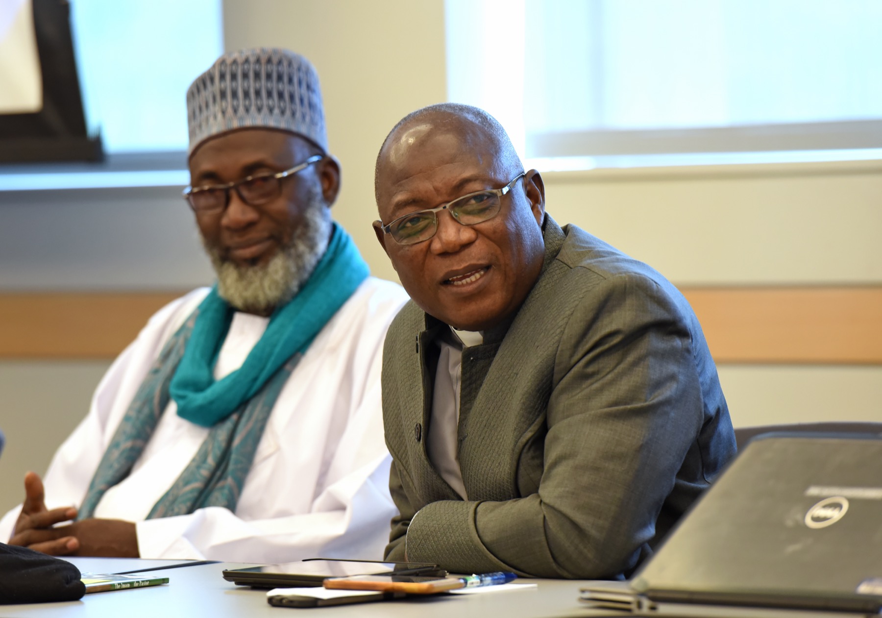 Pastor James Wuye and Imam Muhammad Ashafa seated together.